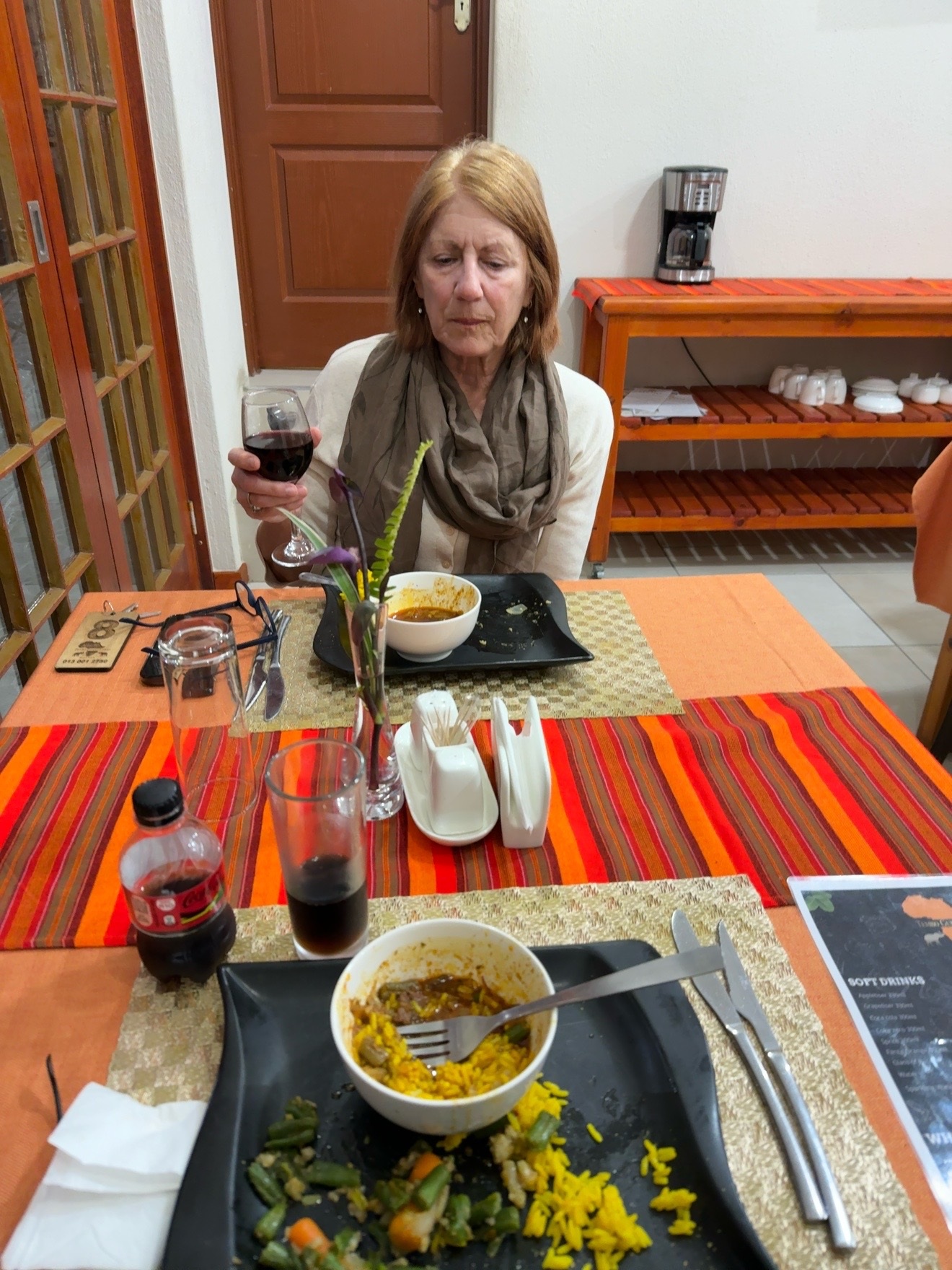 Bonnie, a glass of red, and my plate — which I cannot account for.
