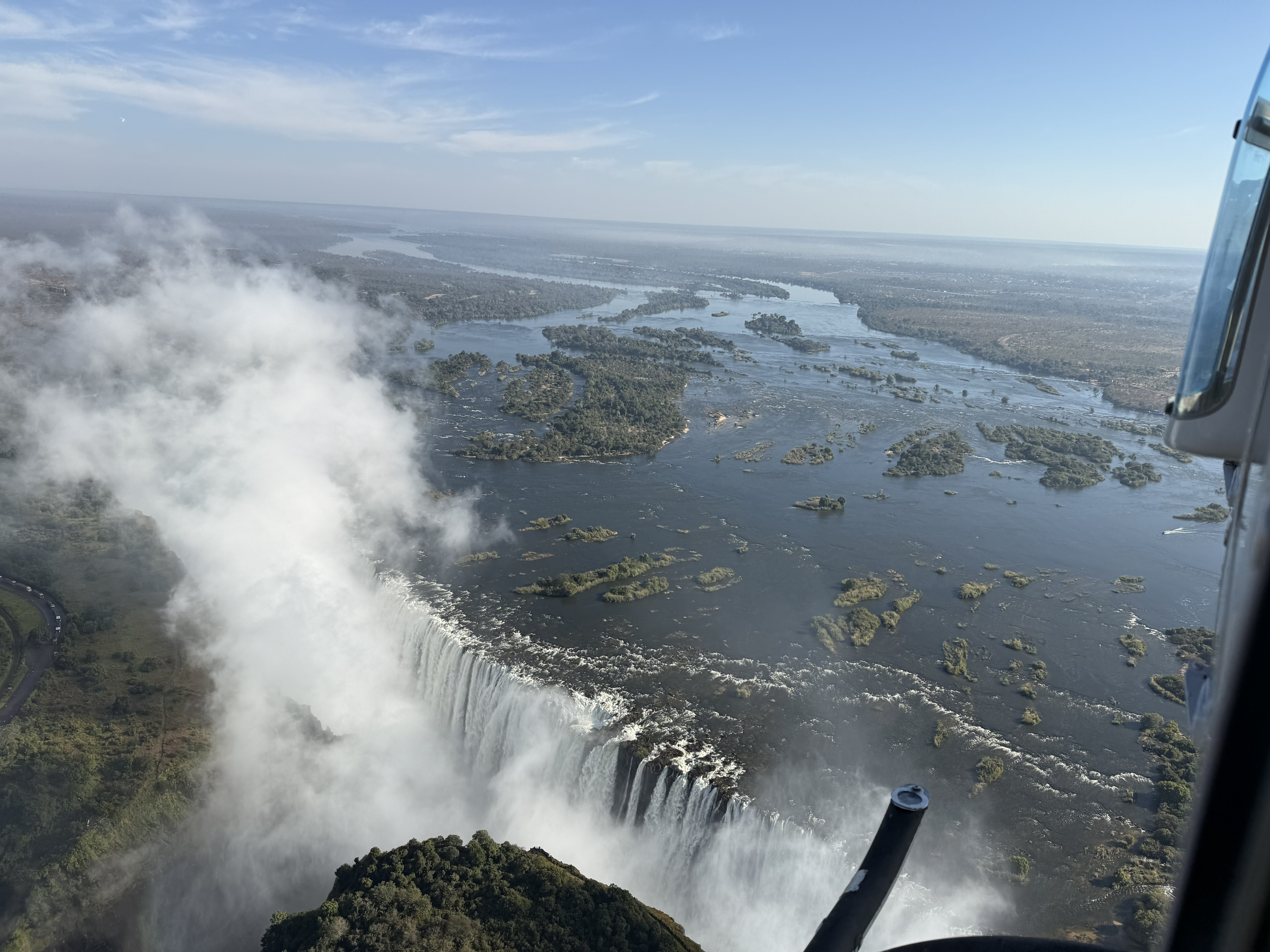 The full width of it, which you cannot see from the ground at all. More than a mile of river simply falling off the edge of the world.
