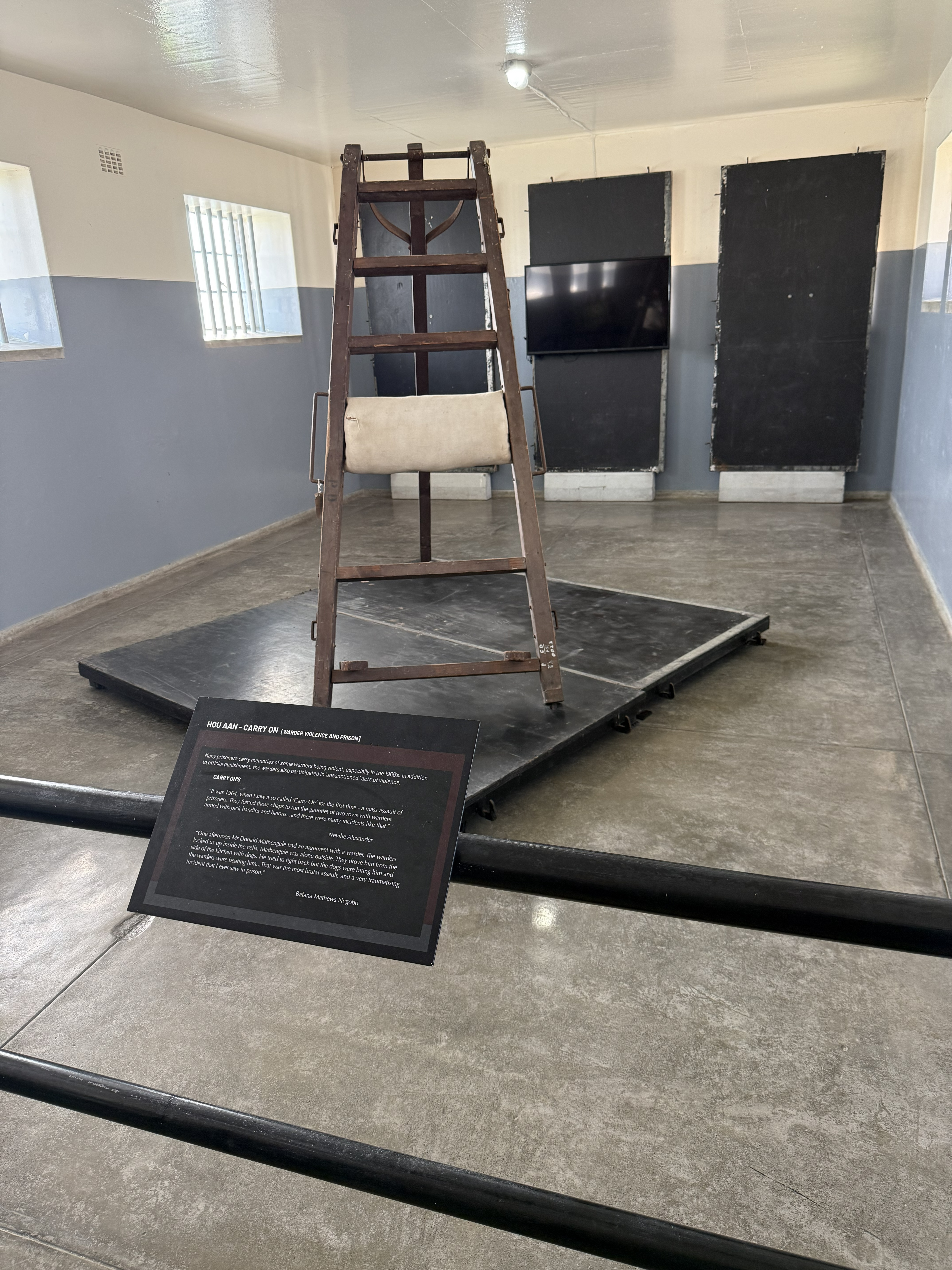 Not every instrument of the place was as quiet as a cell. This is a caning frame: a prisoner was strapped to it and beaten with a cane. The island does not tidy these things away,