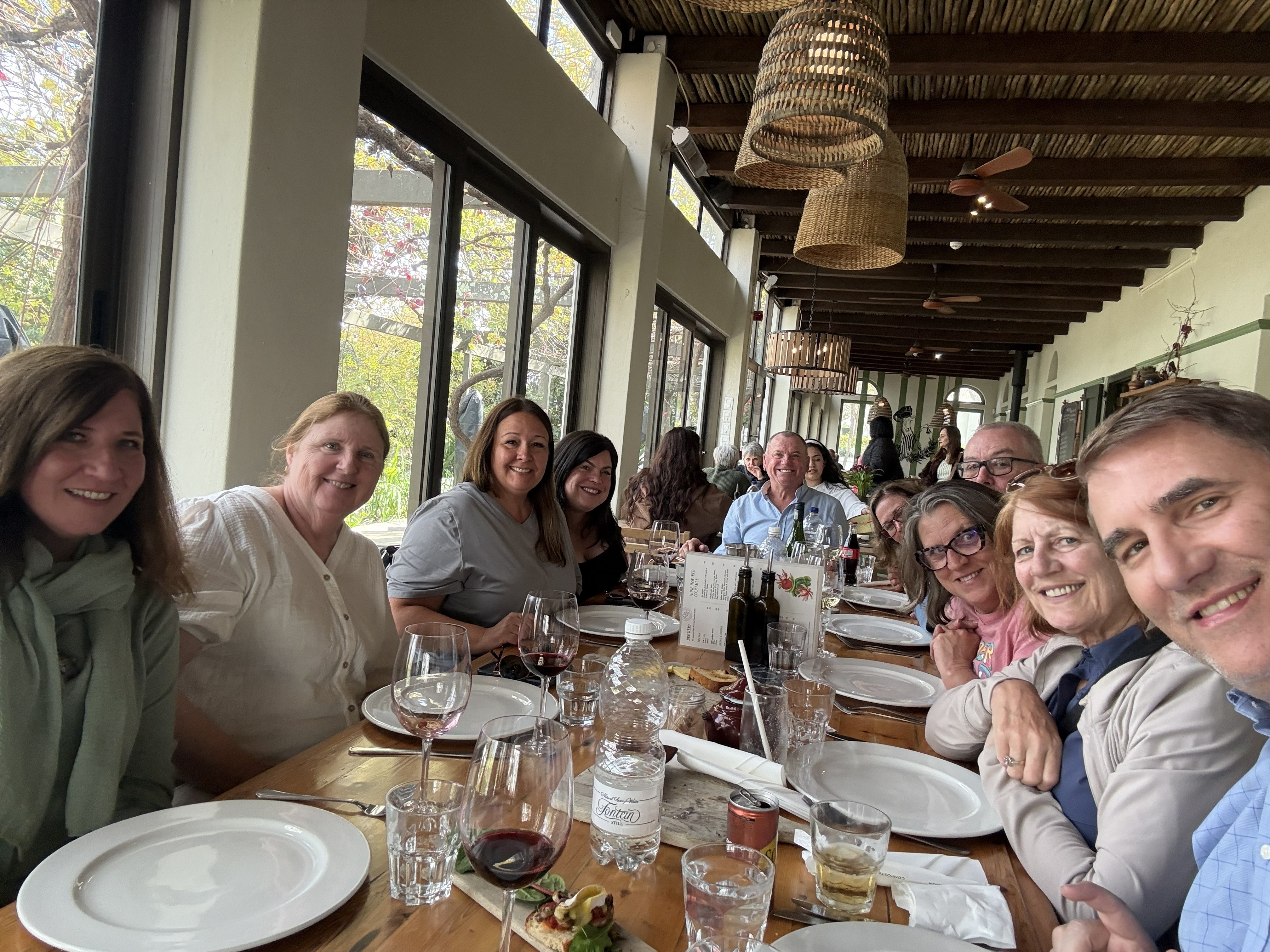 Lunch in Fairview's restaurant — a long table, a lovely meal, and the whole group together.